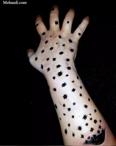 Body art of tiny bugs literally crawling out of the skin of an arm.